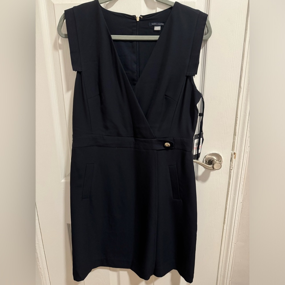 New navy blue dress. Dress is perfect for the office or any other occasion.